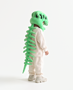 The Dinosaur Skeleton in Green — plush dinosaur skeleton costume with skull hood and spine, side view