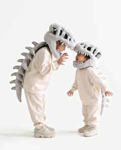 The Dinosaur Skeleton in Grey worn with a friend — plush dinosaur skeleton costumes for pairs