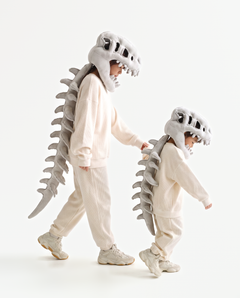 The Dinosaur Skeleton in Grey worn with a friend — plush dinosaur skeleton costumes for pairs