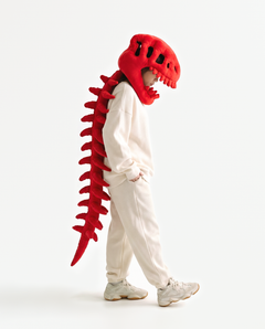 The Dinosaur Skeleton in Red — plush dinosaur skeleton costume with skull hood and spine, side view