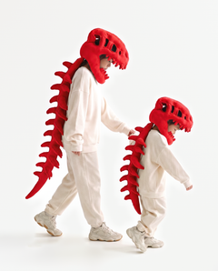 The Dinosaur Skeleton in Red worn with a friend — plush dinosaur skeleton costumes for pairs