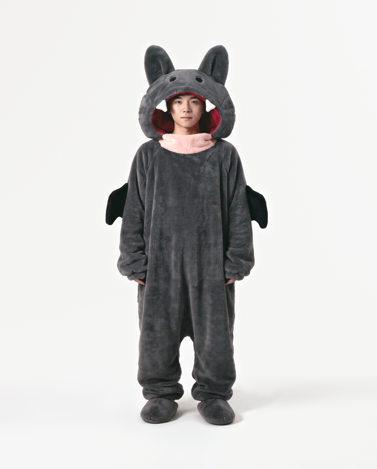 The Fang Onesie in Charcoal — fleece monster onesie with pointed ears and fangs, front view