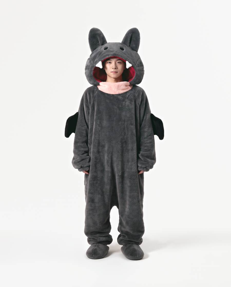 The Fang Onesie in Charcoal — fleece monster onesie with pointed ears and fangs, front view