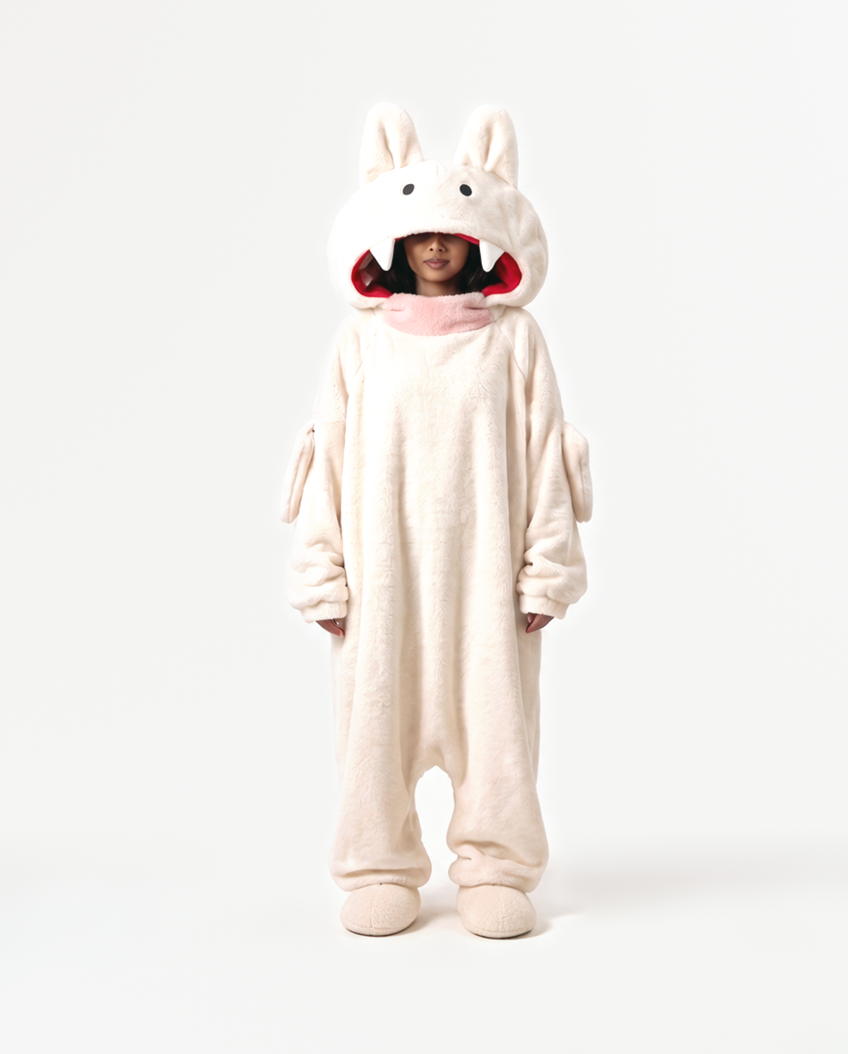 The Fang Onesie in Cream — fleece monster onesie with pointed ears and fangs, front view