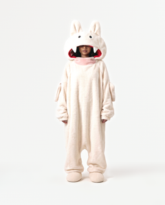 The Fang Onesie in Cream — fleece monster onesie with pointed ears and fangs, front view