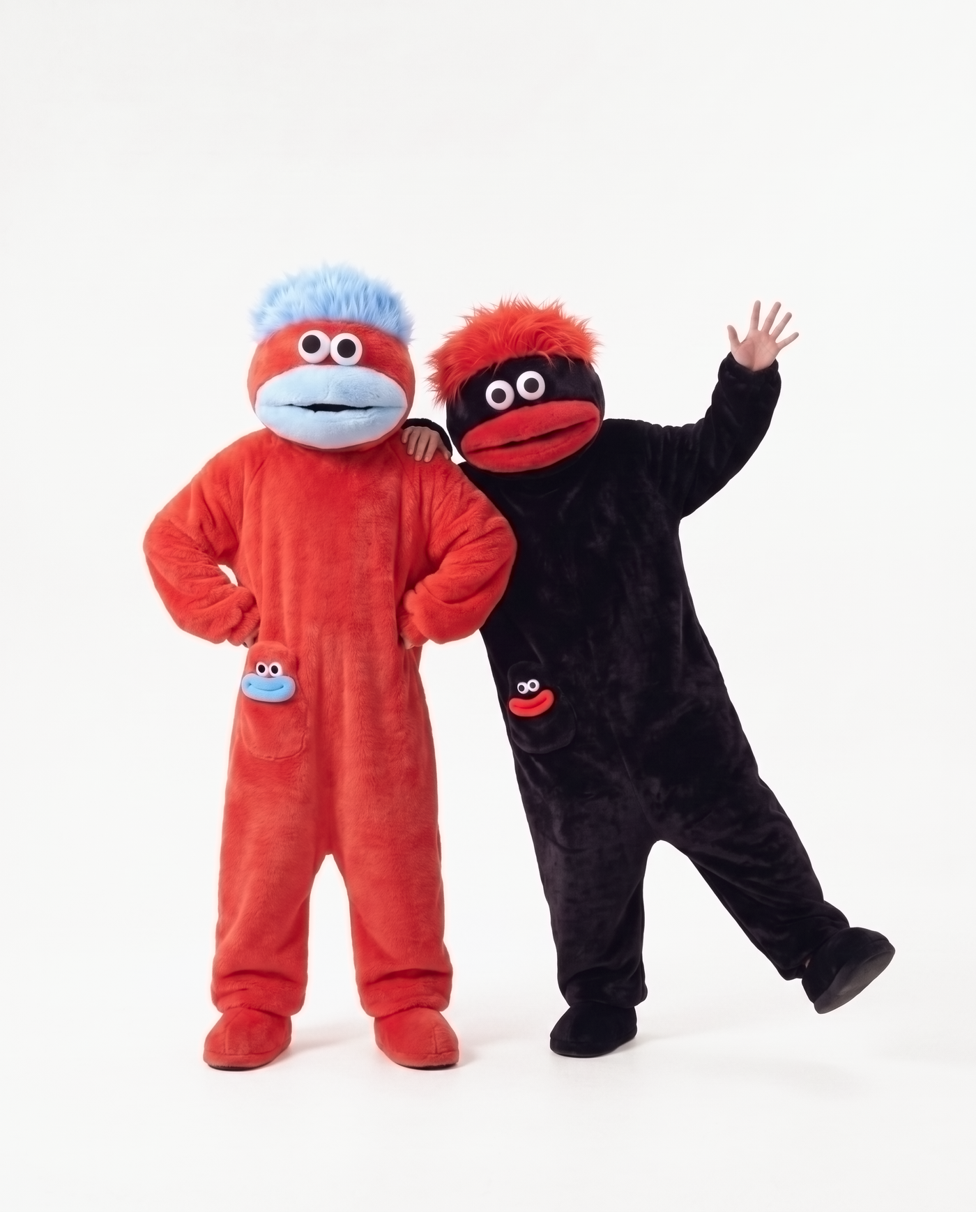 Midnight and Cherry monster onesies together