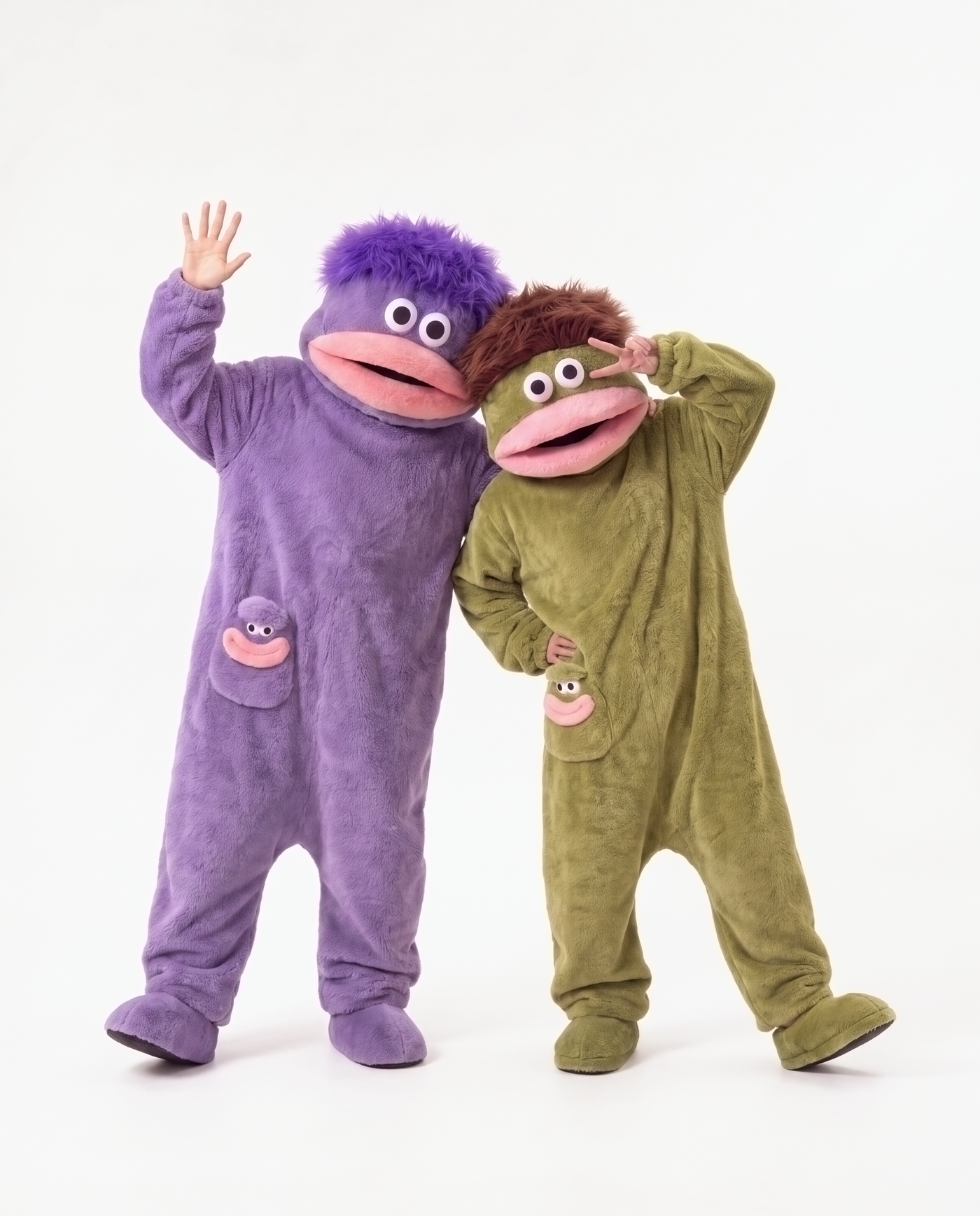 Grape Fuzz monster onesie with a friend