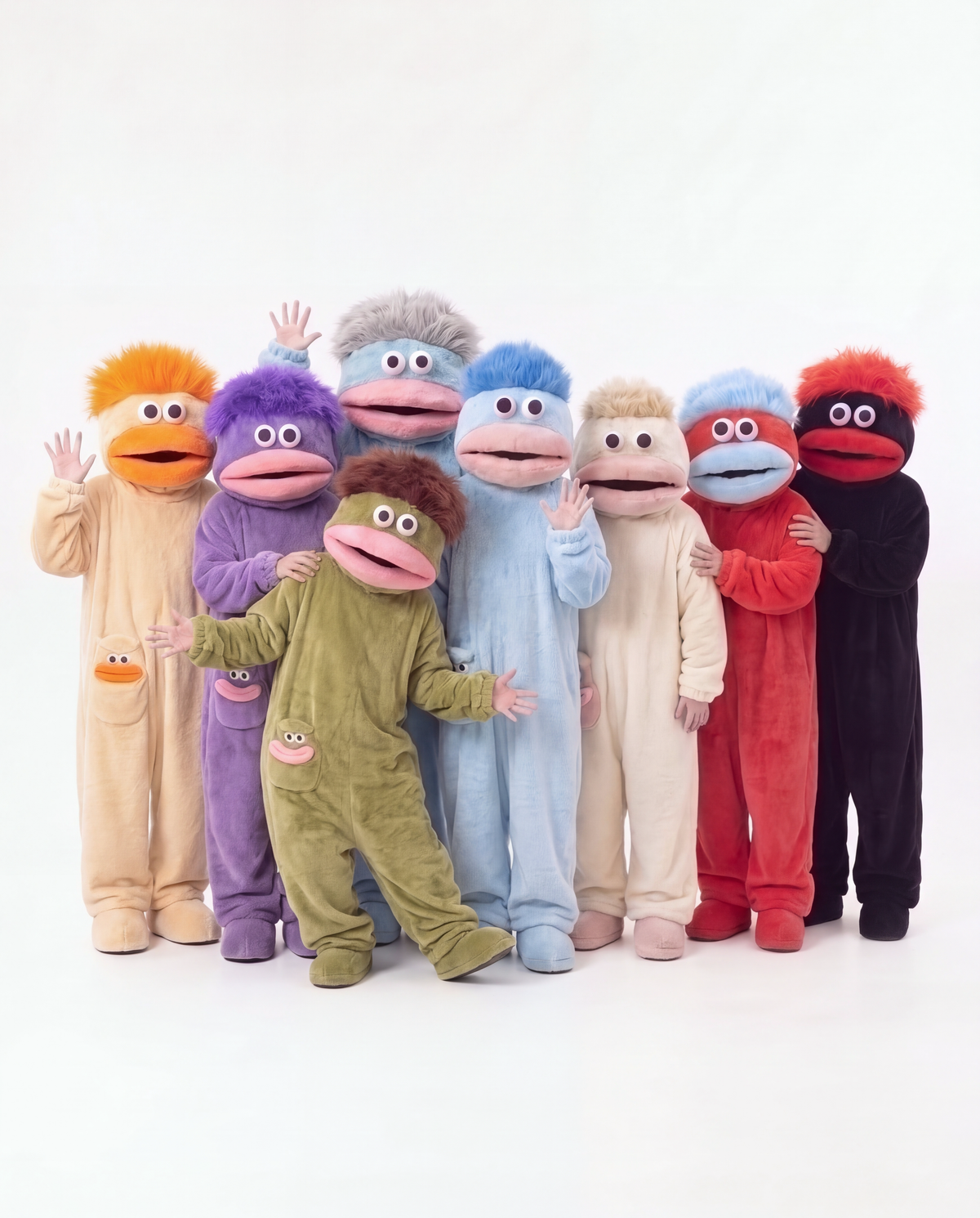 All eight Monster Onesie colors together — group Halloween onesies for friends and family